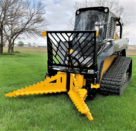 skid steer tree puller video